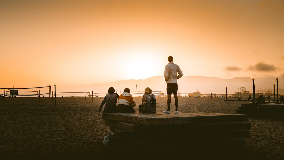 Caught these friends watching the sunset together in Venice beach. One of my favorite photos.